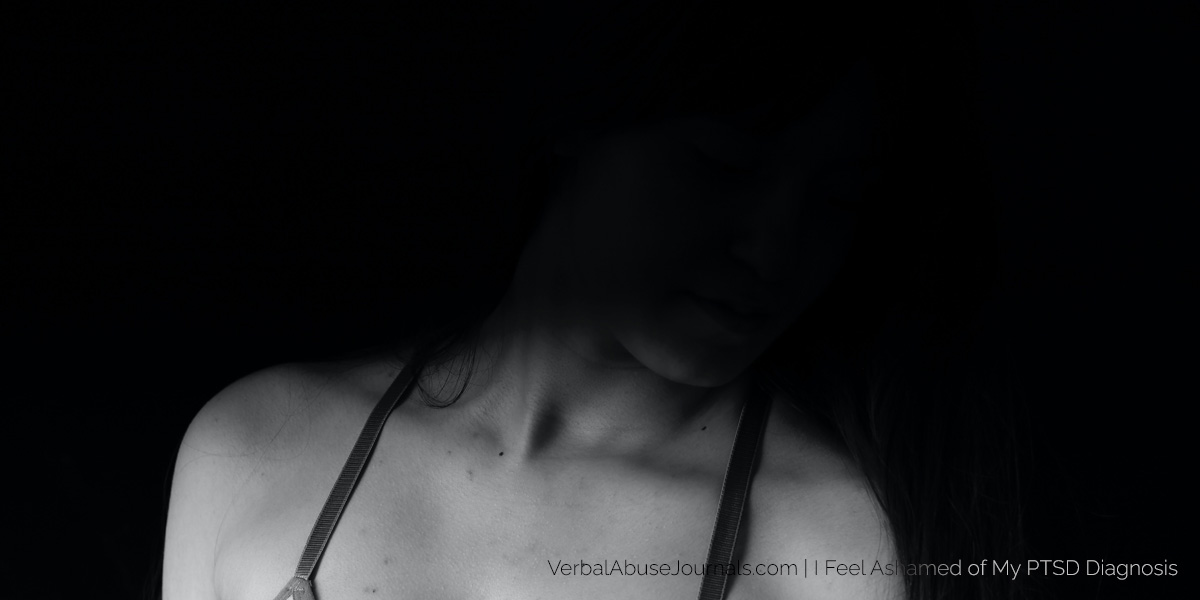 Woman's head and upper chest, head in shadows as if she's ashamed of her PTSD diagnosis and doesn't want you to see her.